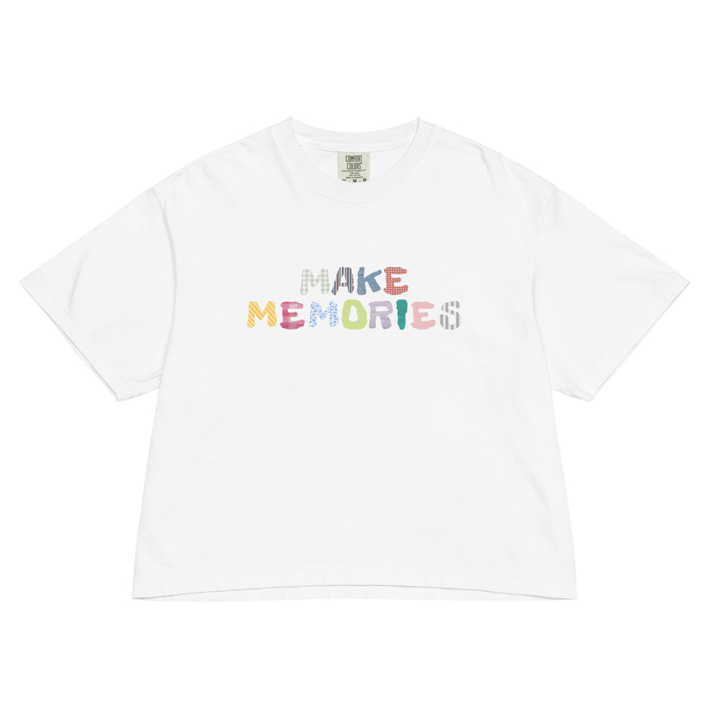 White t-shirt with 'MAKE MEMORIES' text in colorful letters on a white background