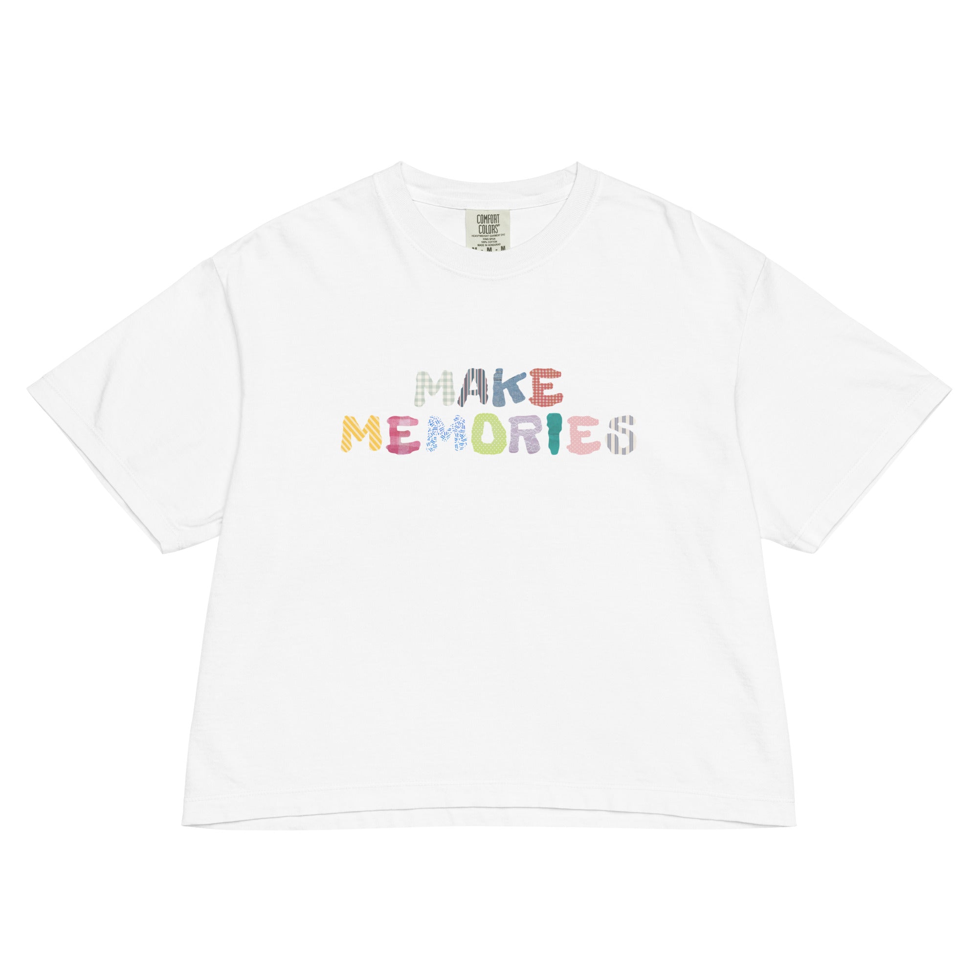 White t-shirt with 'MAKE MEMORIES' text in colorful letters on a white background
