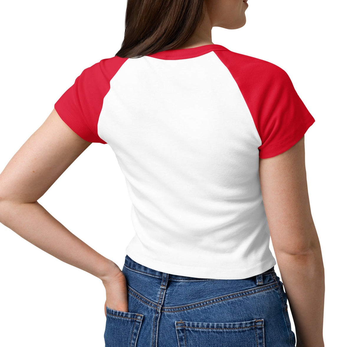 Woman wearing a red and white baseball-style shirt with blue jeans on a white background
